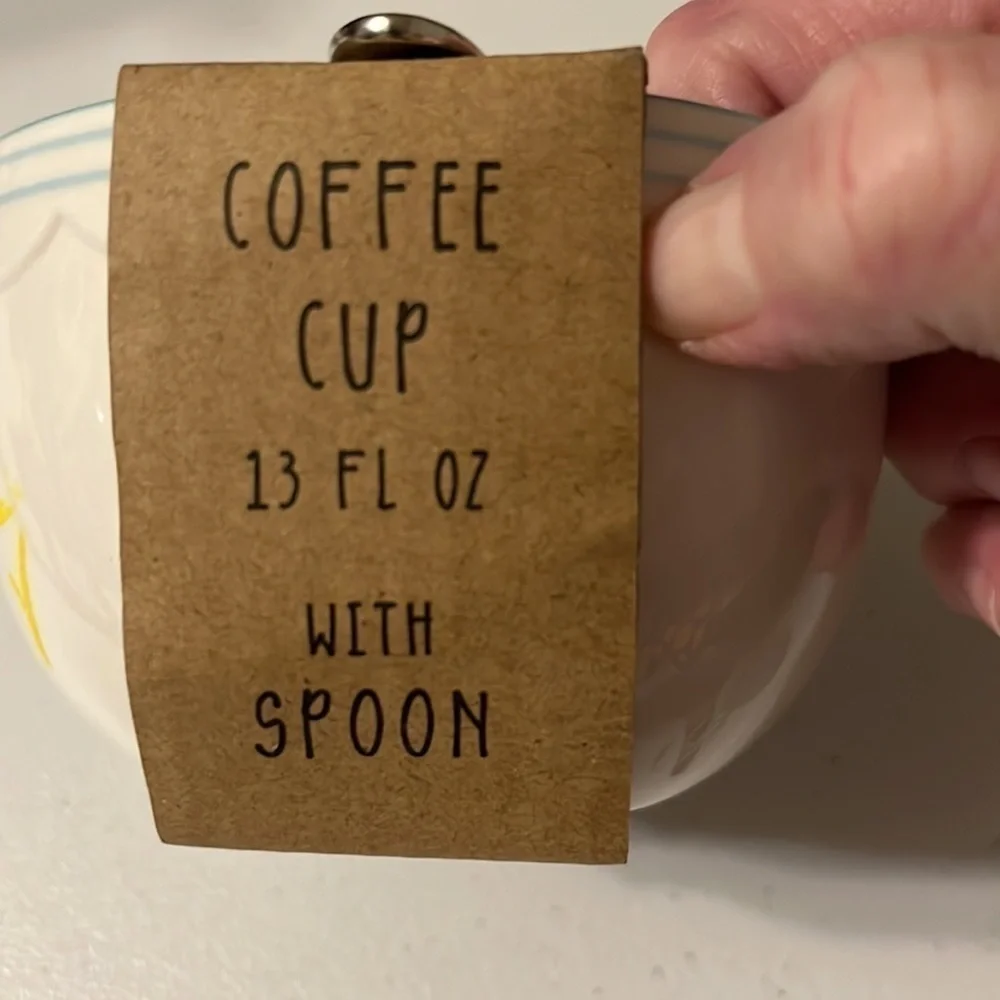 Coffee cup13 0z with spoon.
